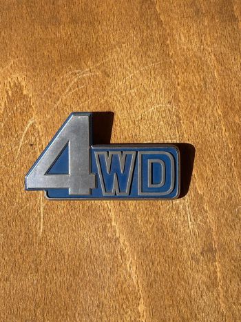 A 4wd badge from a Land Cruiser